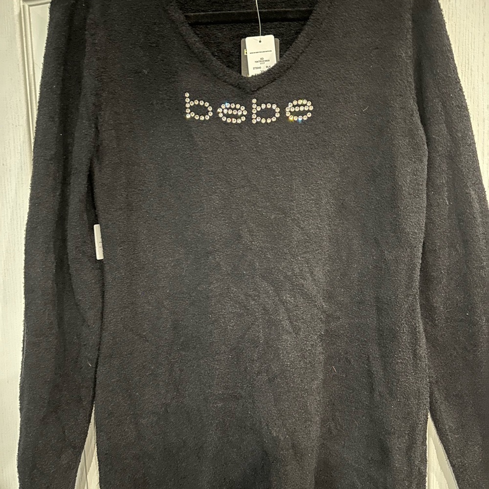 Bebe women’s sweater dress. Black in color. Size XL